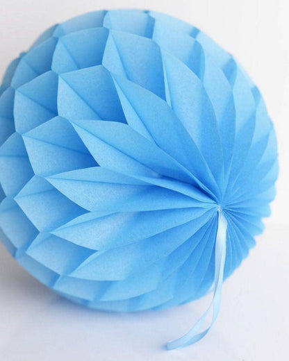 Light blue decorative sphere with a layered, pleated texture and a ribbon for hanging.