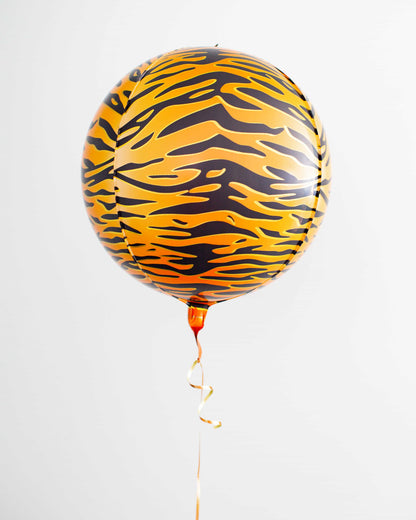 A vibrant orange balloon with a black tiger stripe pattern, floating against a white background, with a curled ribbon.