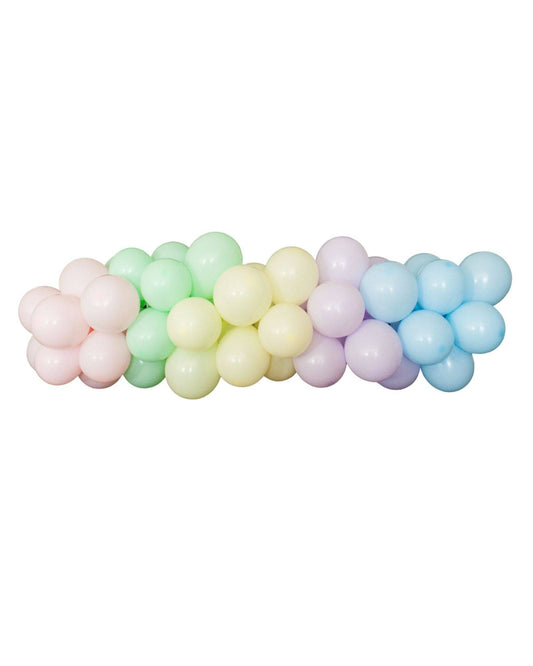 Pastel-colored balloons arranged in a gradient, creating a whimsical and vibrant display.