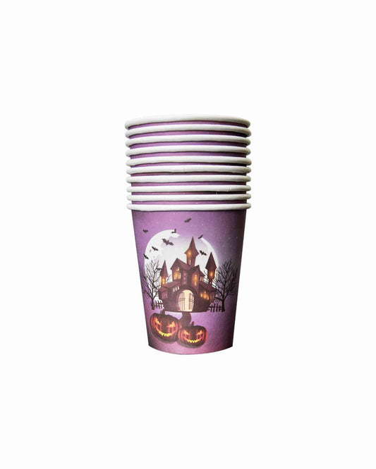 Stack of Halloween-themed cups featuring a spooky castle and carved pumpkins against a purple background.