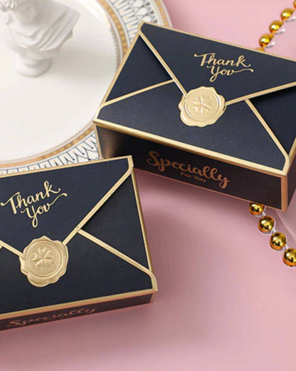 Elegant navy blue favor boxes with gold accents, featuring "Thank You" and "Specially For You" inscriptions.