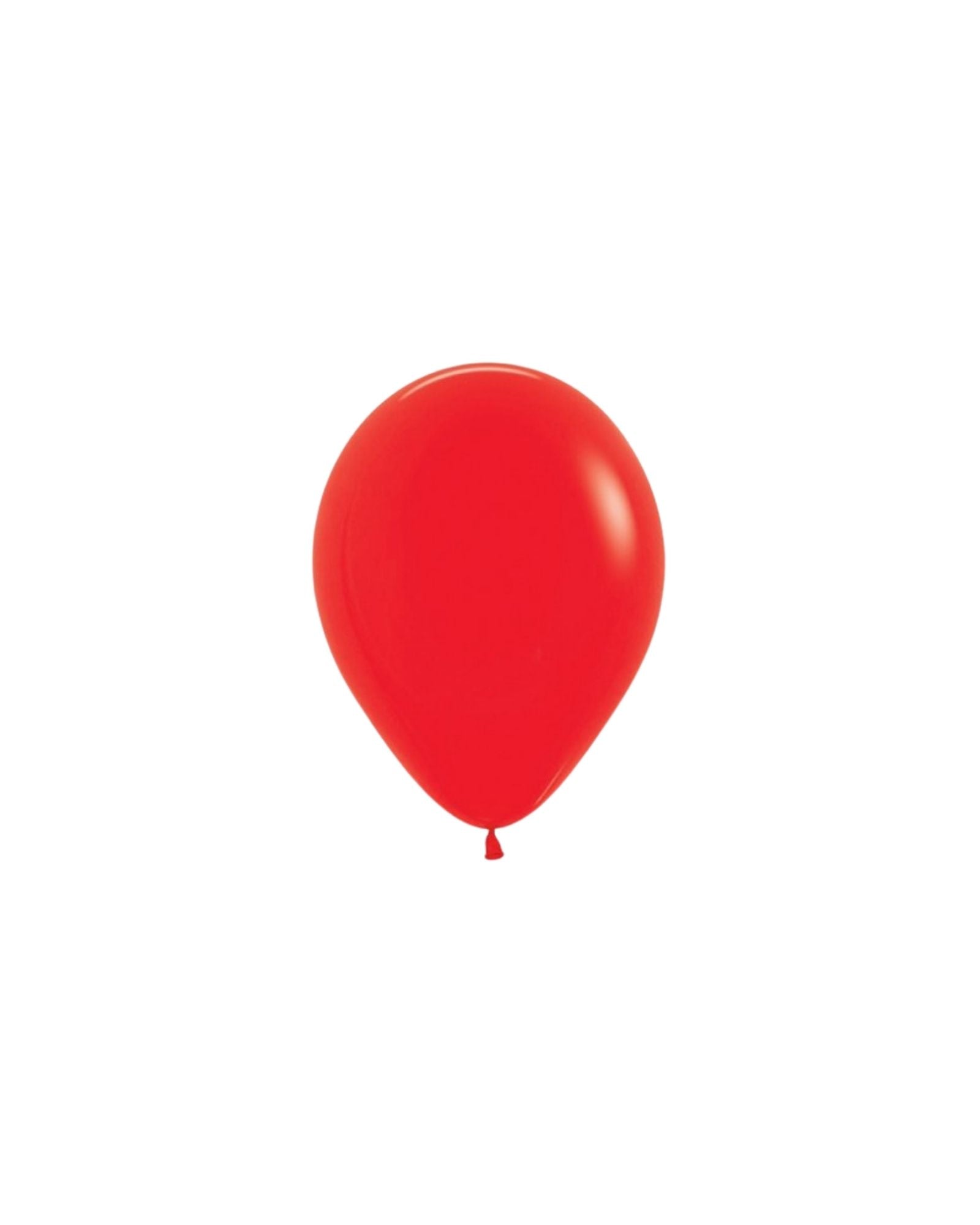 Bright red round balloon against a plain white background, showcasing a smooth, glossy surface and a tied end.